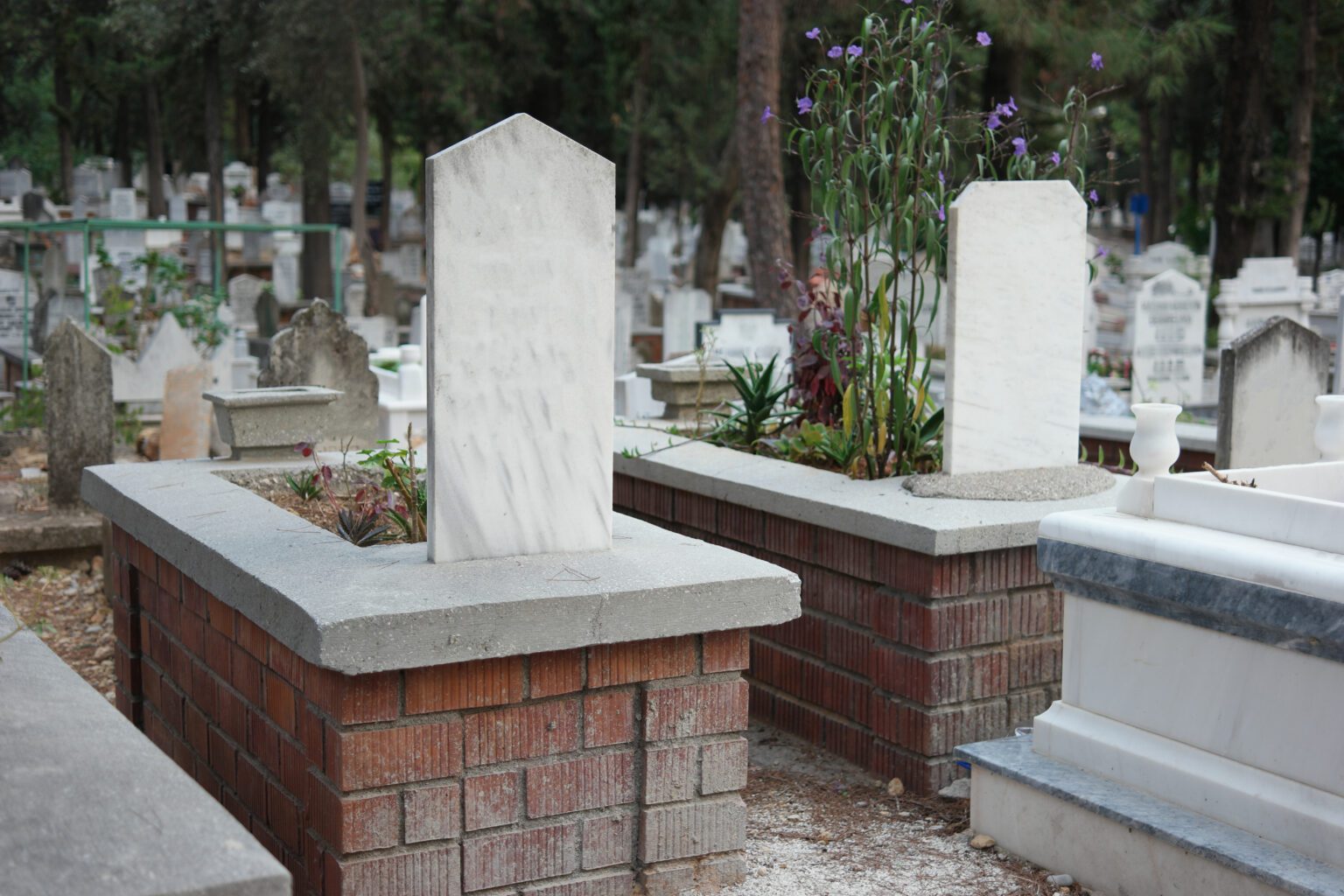 Muslim graveyard background. Tombstones and graves in Muslim cemetery, Turkey.